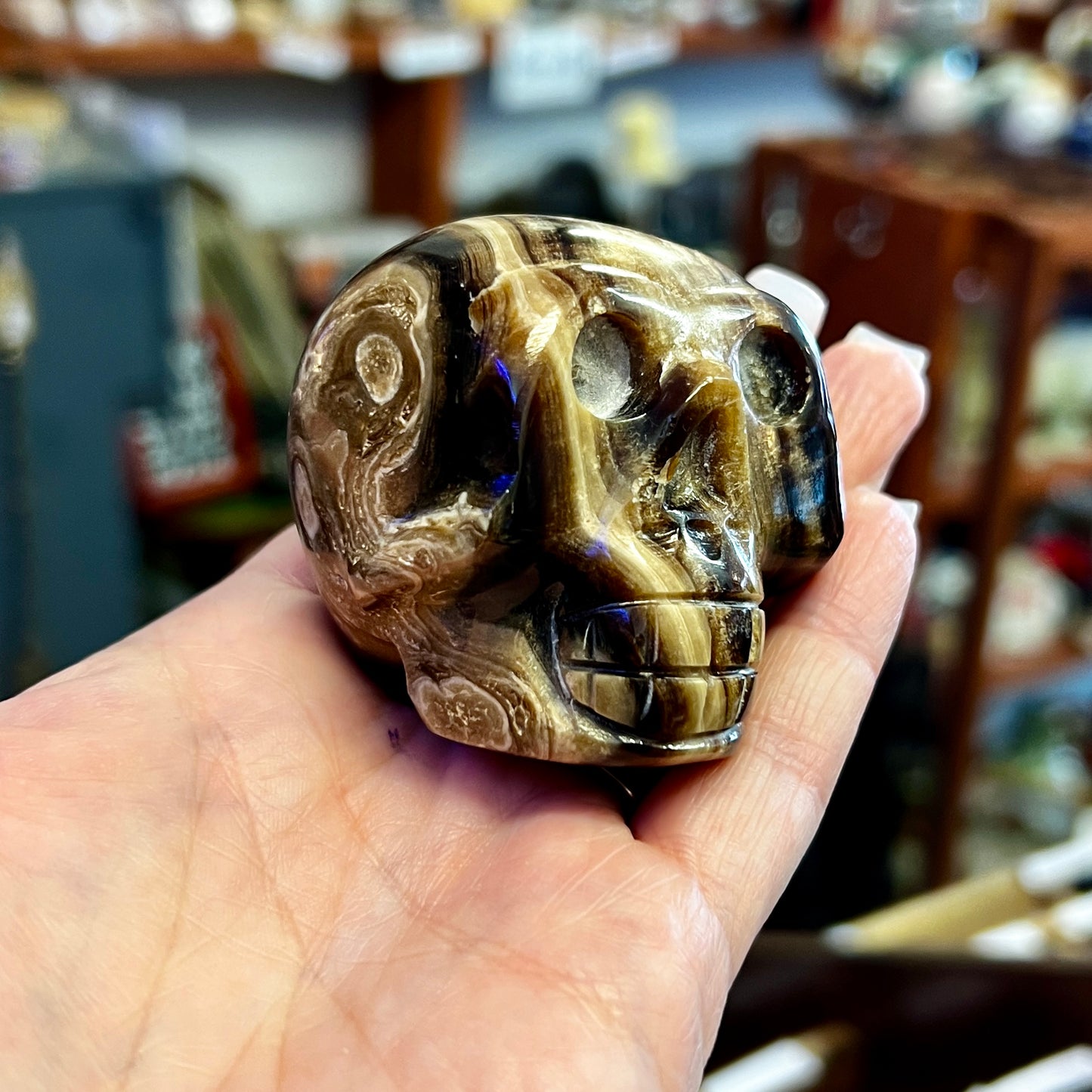 Chocolate Calcite Skull Carvings